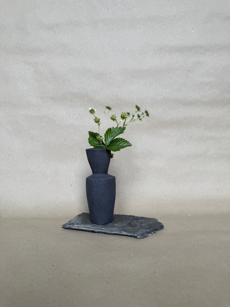 Tiny black bud vase II