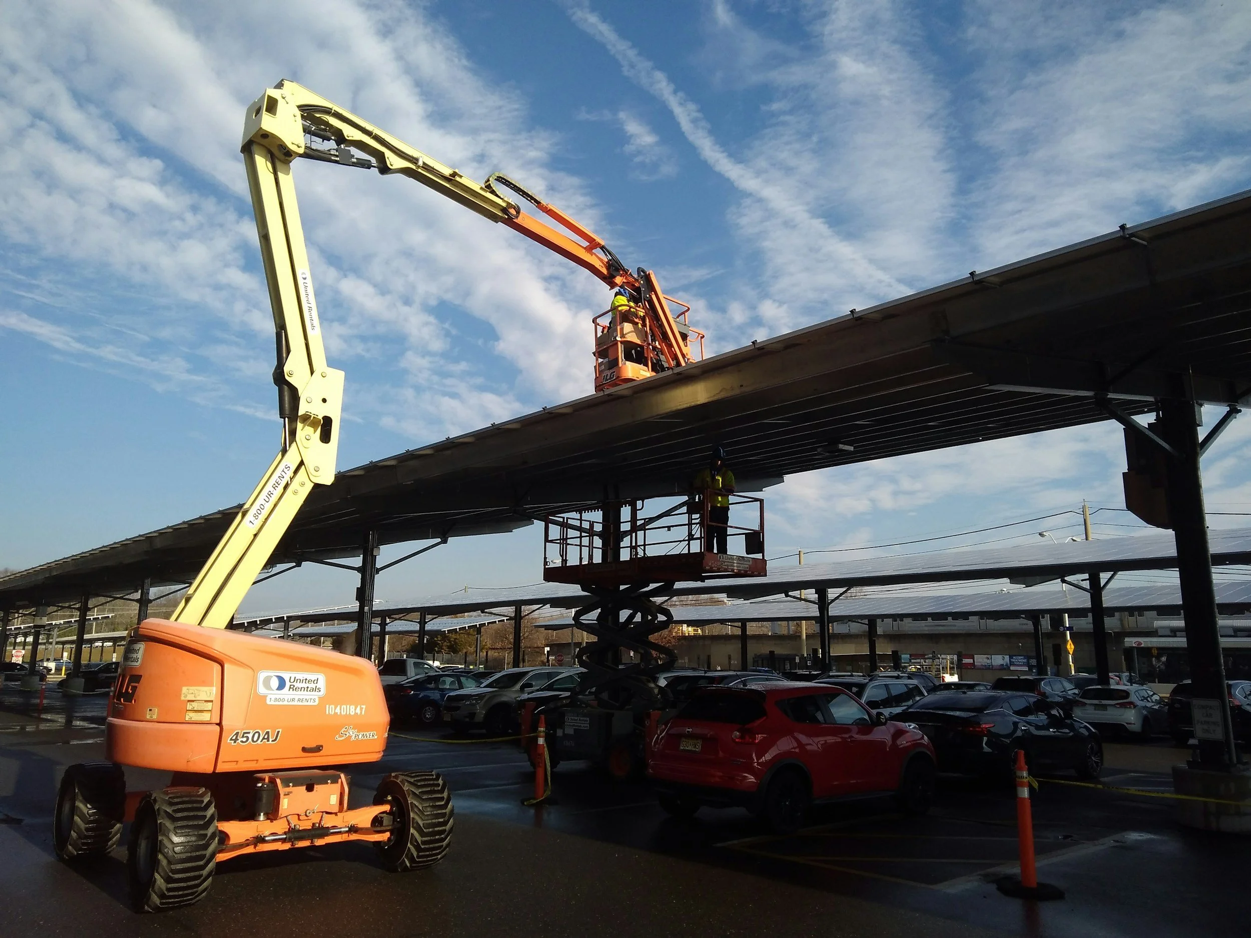 Engineer working at height from a boom lift cherry picker