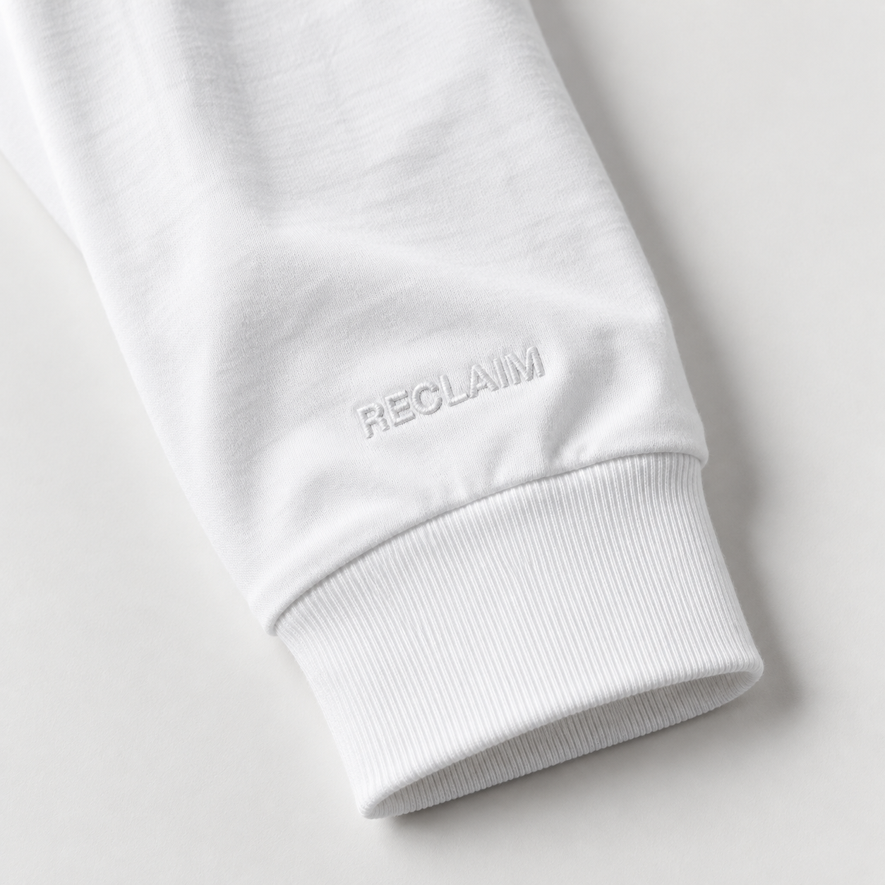 White Reclaim Sleeve Cuff Detail.png