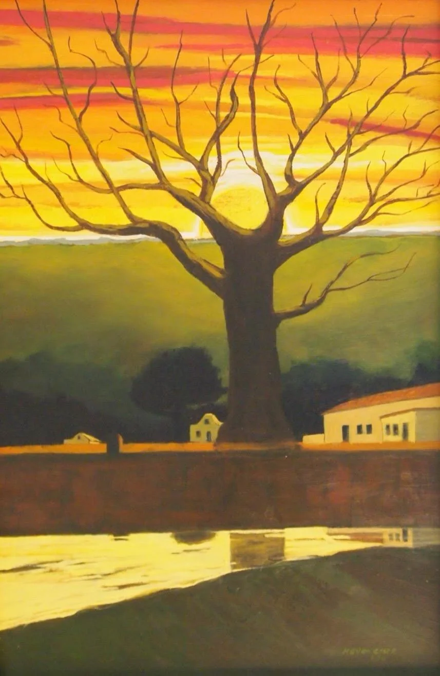 A painting of a large, leafless tree against a sunset sky with vibrant orange, yellow, and purple hues, reflecting on a body of water below, with a few small houses in the background and green rolling hills.