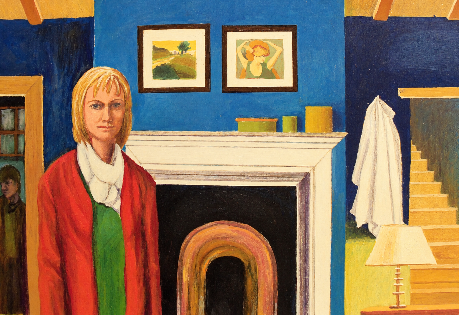 A woman with blonde hair wearing a red jacket over a green top and white scarf, standing in a colorful room with a fireplace, two framed pictures on the blue wall, a staircase, and a table with a lamp.