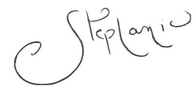 Handwritten Stephanie's signature in black ink