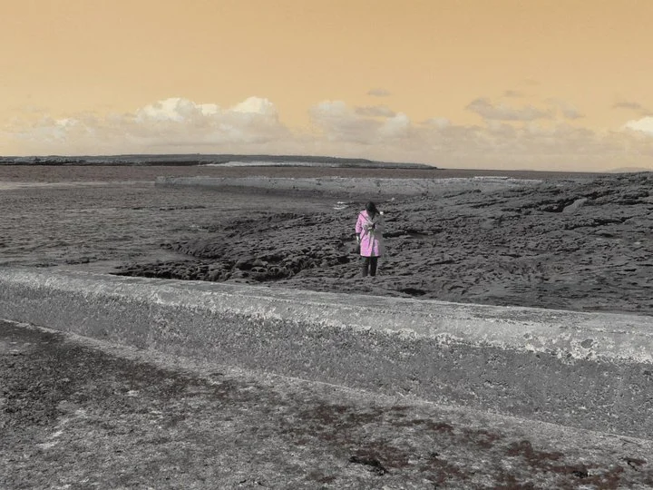 At the Edge of the World (2011). She walked off on her own, away from the group, pensive. On the shore of Ireland, she experienced something the rest of us missed.