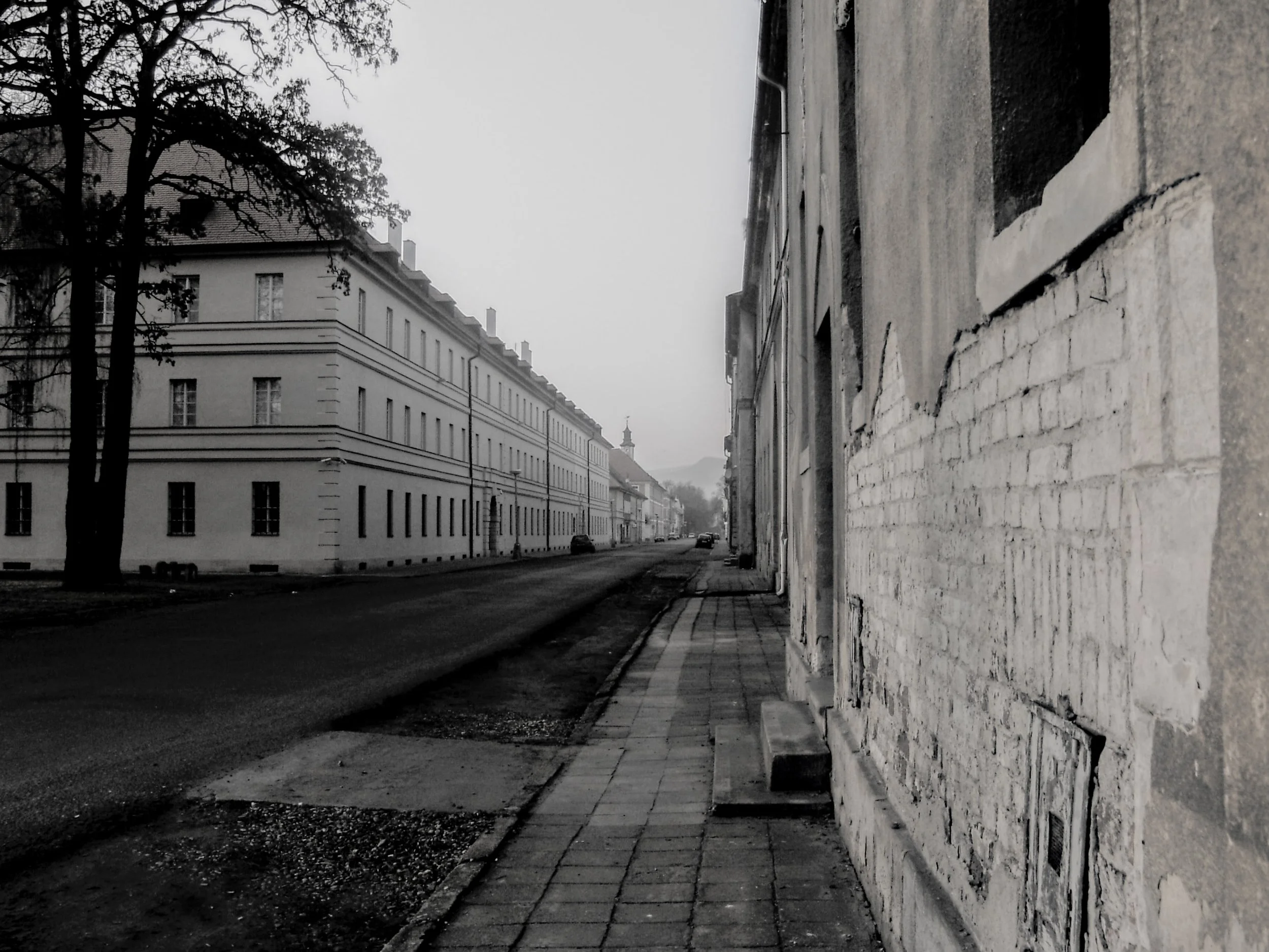 Street in Terezín (2012). These streets have stories. They saw horrors and they saw defiance. I heard their requiem as I walked the streets north of Prague.