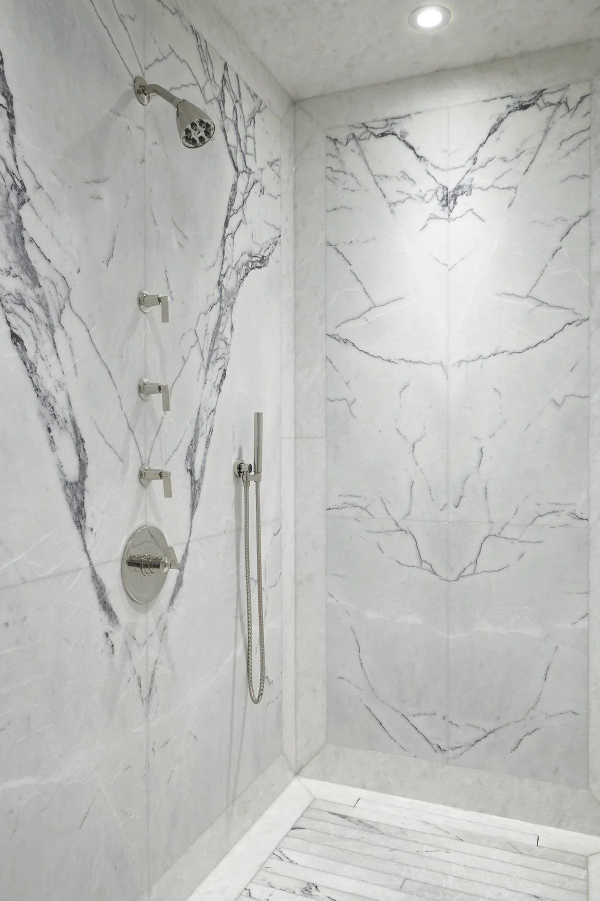 Book-matched marble shower wall