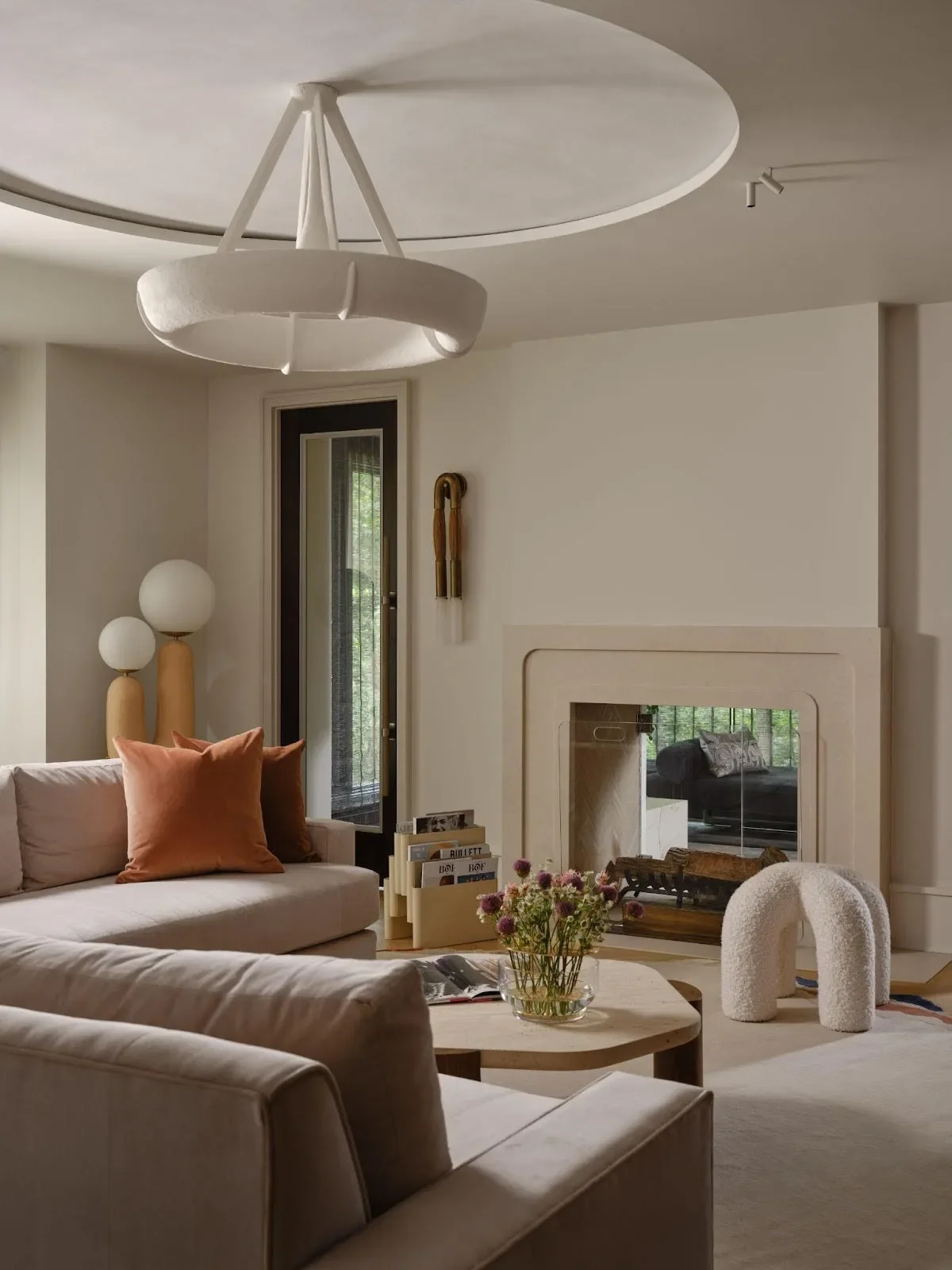 Rosedale family room with stone fireplace, featured in AD Italia, built by Goldcon