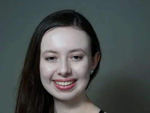Karis+Hand+headshot.webp