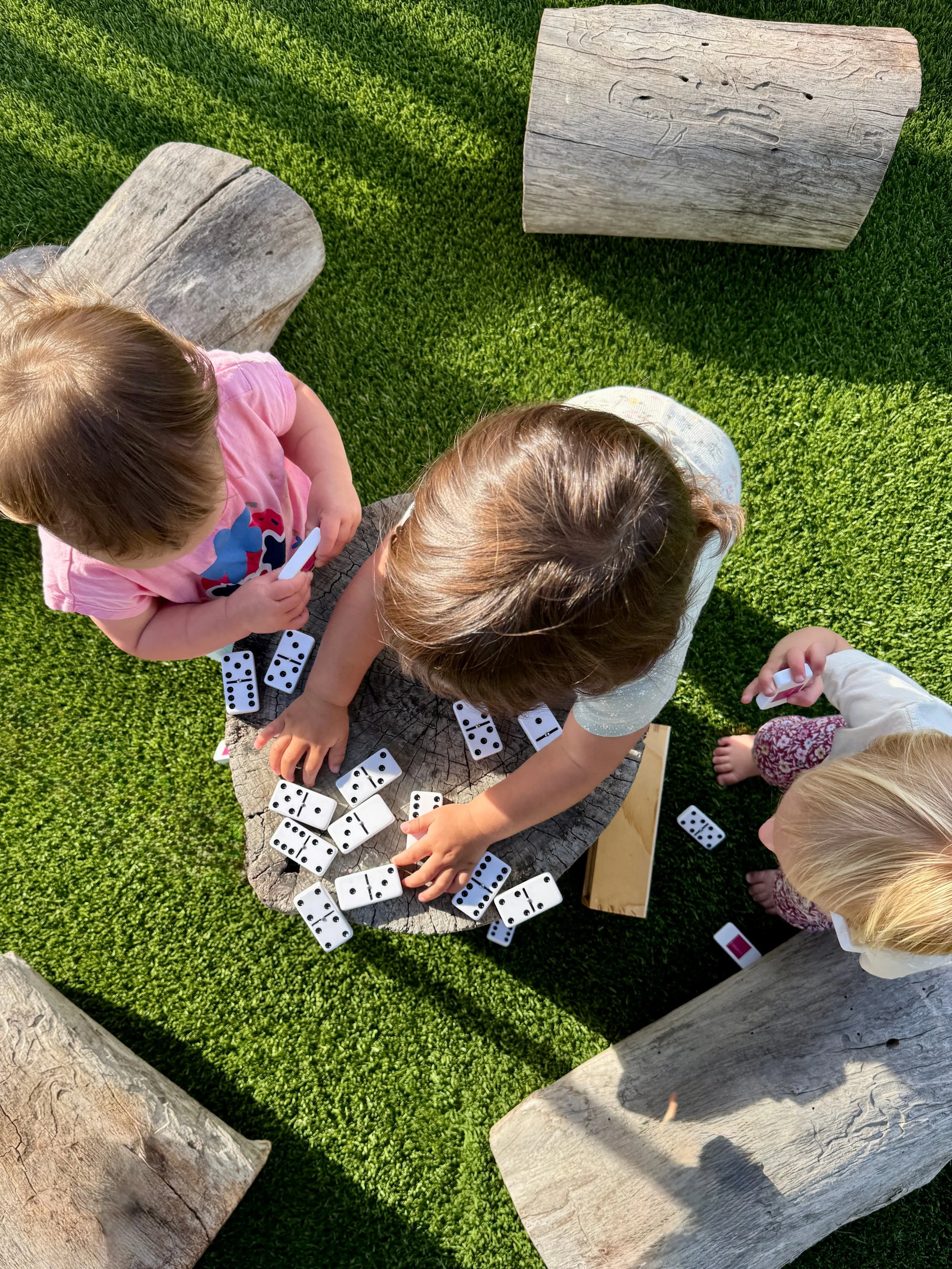 Daycare Center Children Playing Dominoes