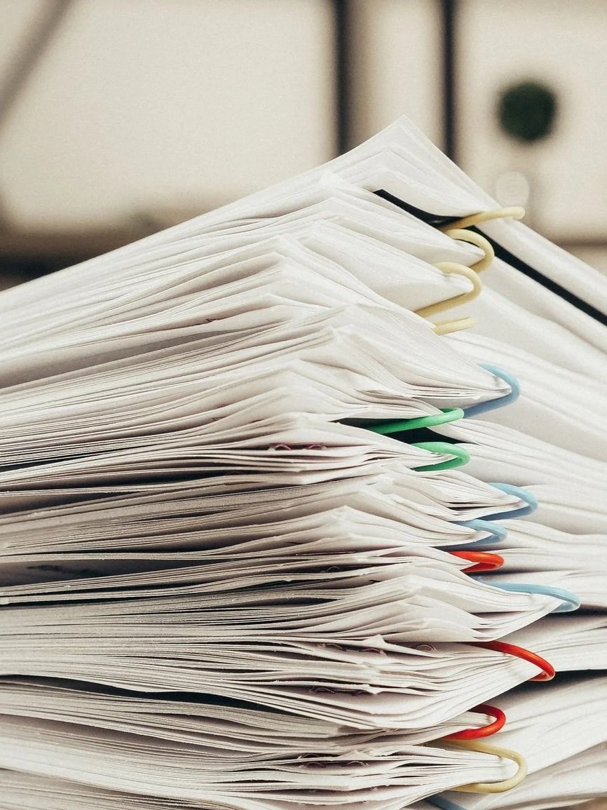 Stack of printable daycare paperwork and e-products