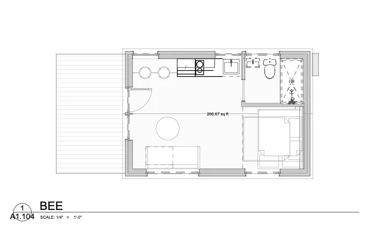 Floor plan of the plum prefab BEE, a small and elegant living space with a kitchen, bathroom, and bedroom.