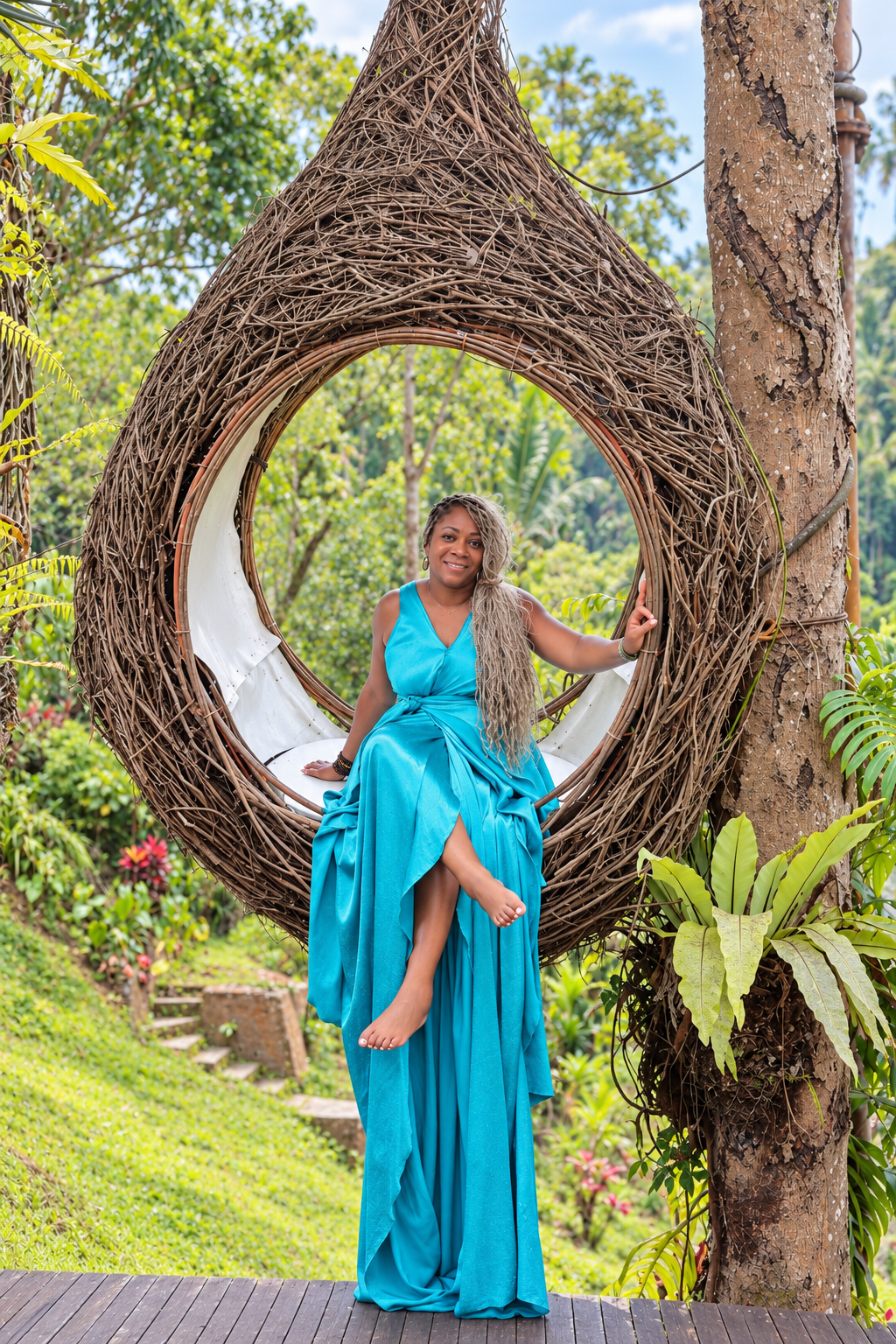 Blonde-Braided Woman in Tropical Nest Swing (1).png