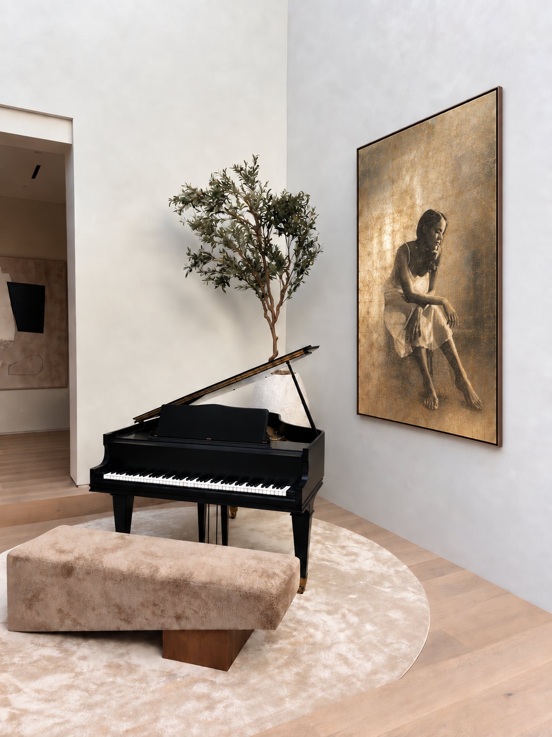 A black grand piano with an open lid in a modern, minimalist room. Next to the piano is a beige upholstered bench. There is a tall, leafy green plant behind the piano and a large framed artwork of a woman sitting on the wall to the right. The room has light wooden flooring and a soft, round rug.