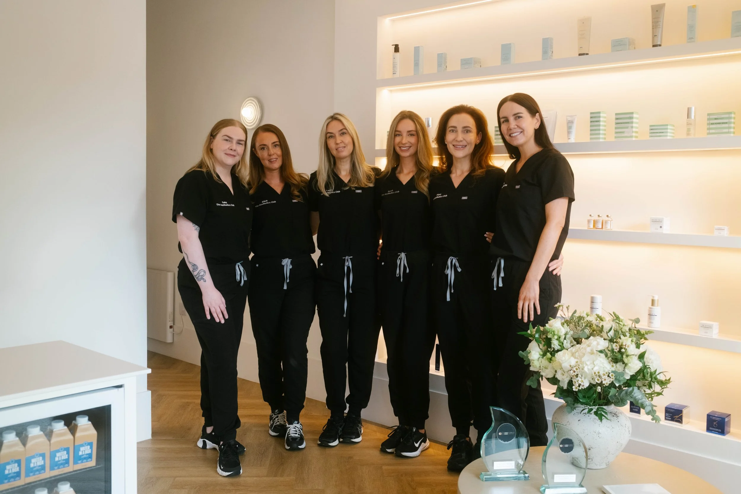 The Aesthetics Club team, photographed in August 2026