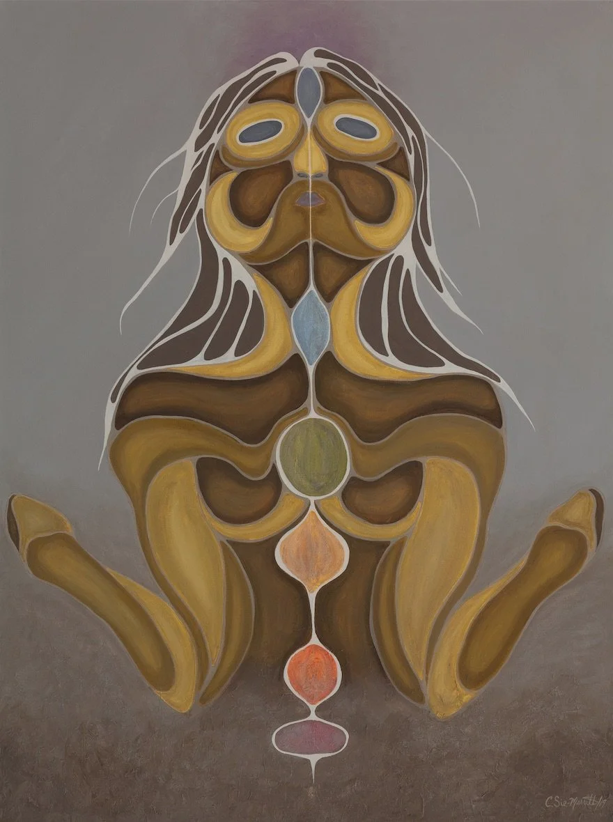 Abstract painting of a frog with symmetrical patterns and earthy colors including yellow, brown, blue, orange, and green.