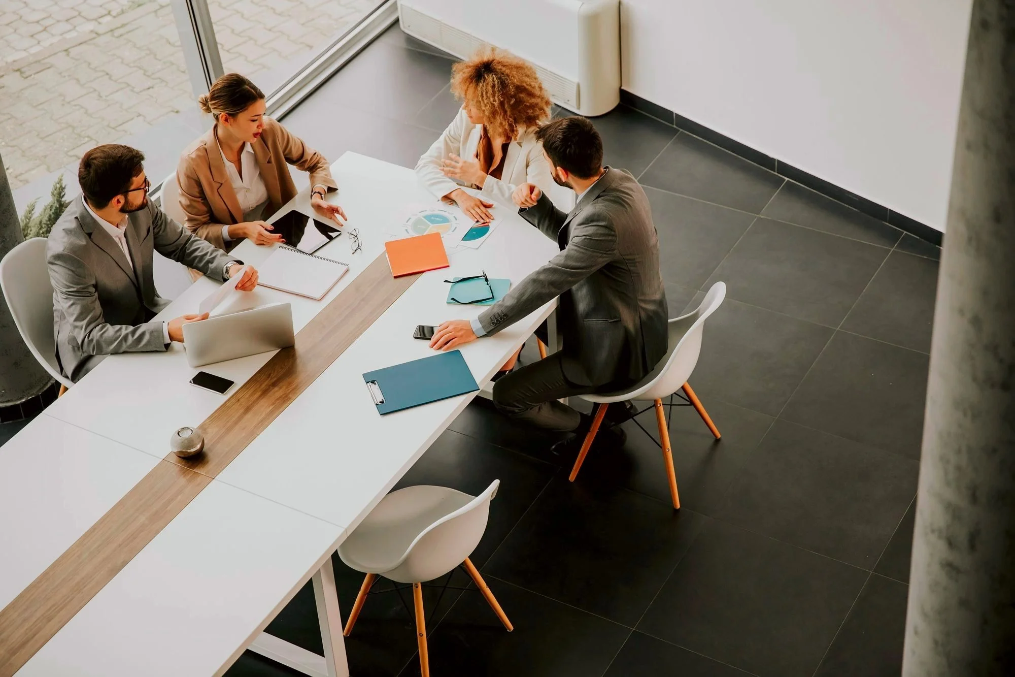 Colleagues in a working session at a table