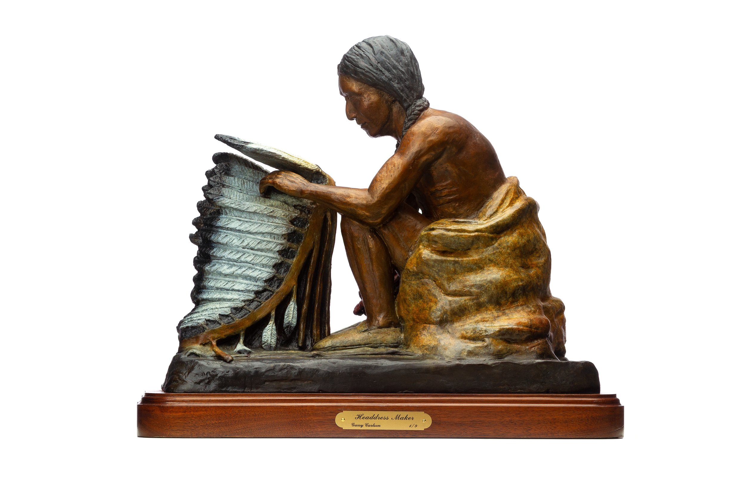 Headdress Maker • 19"w x 18"h x 13"d • Bronze mounted on walnut base Edition of 9
