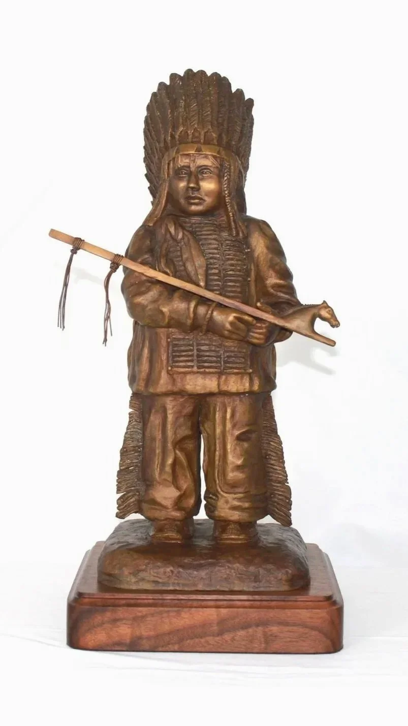 Cheyanne Boy  9"w x 17"h x 9"d Bronze mounted on walnut base Edition 7