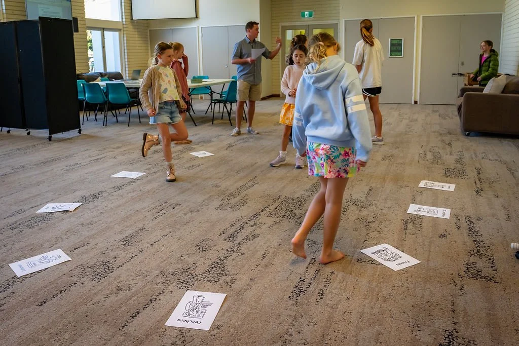 Children taking part in an active KidsChurch learning game.