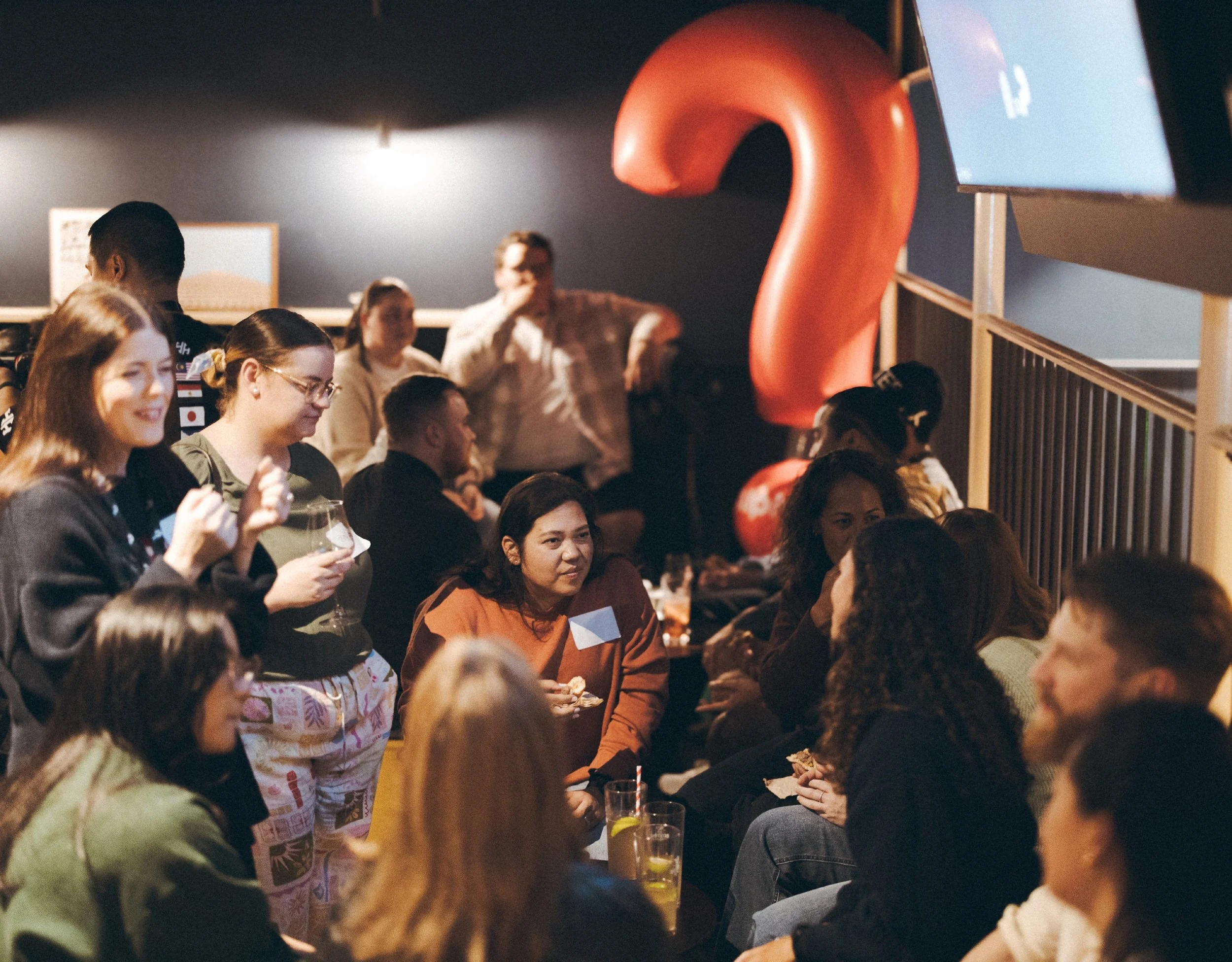 People sharing food and conversation at Alpha.