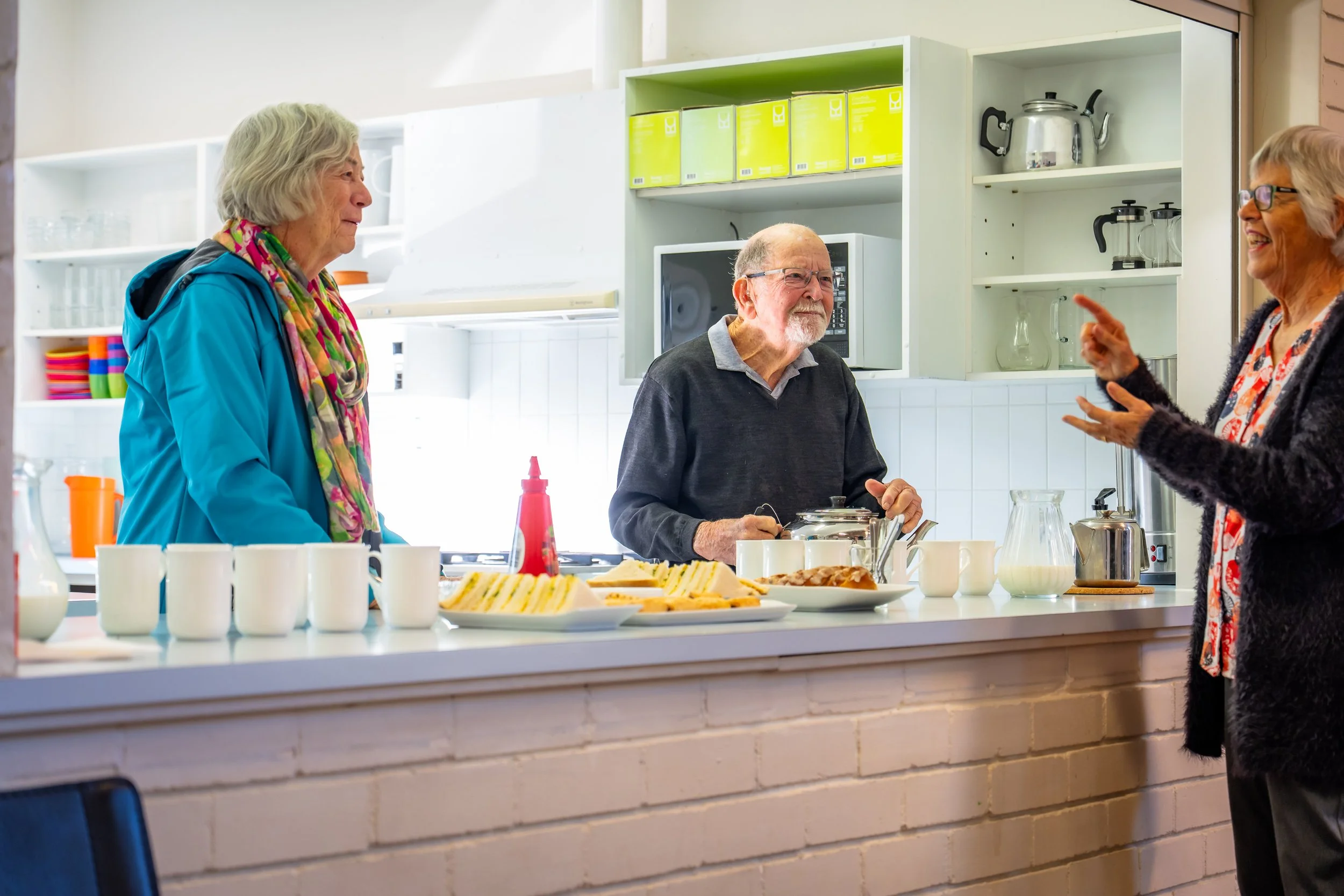 Older church members preparing and sharing morning tea at St Philips.
