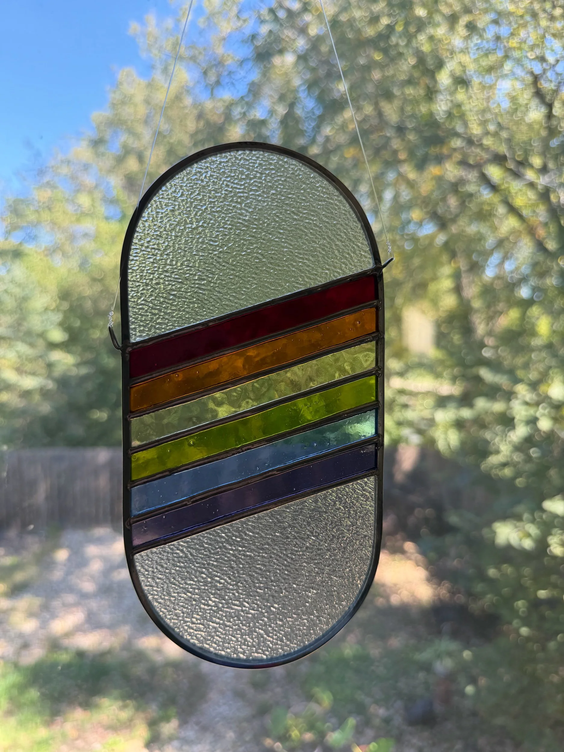 Rainbow striped capsule suncatcher