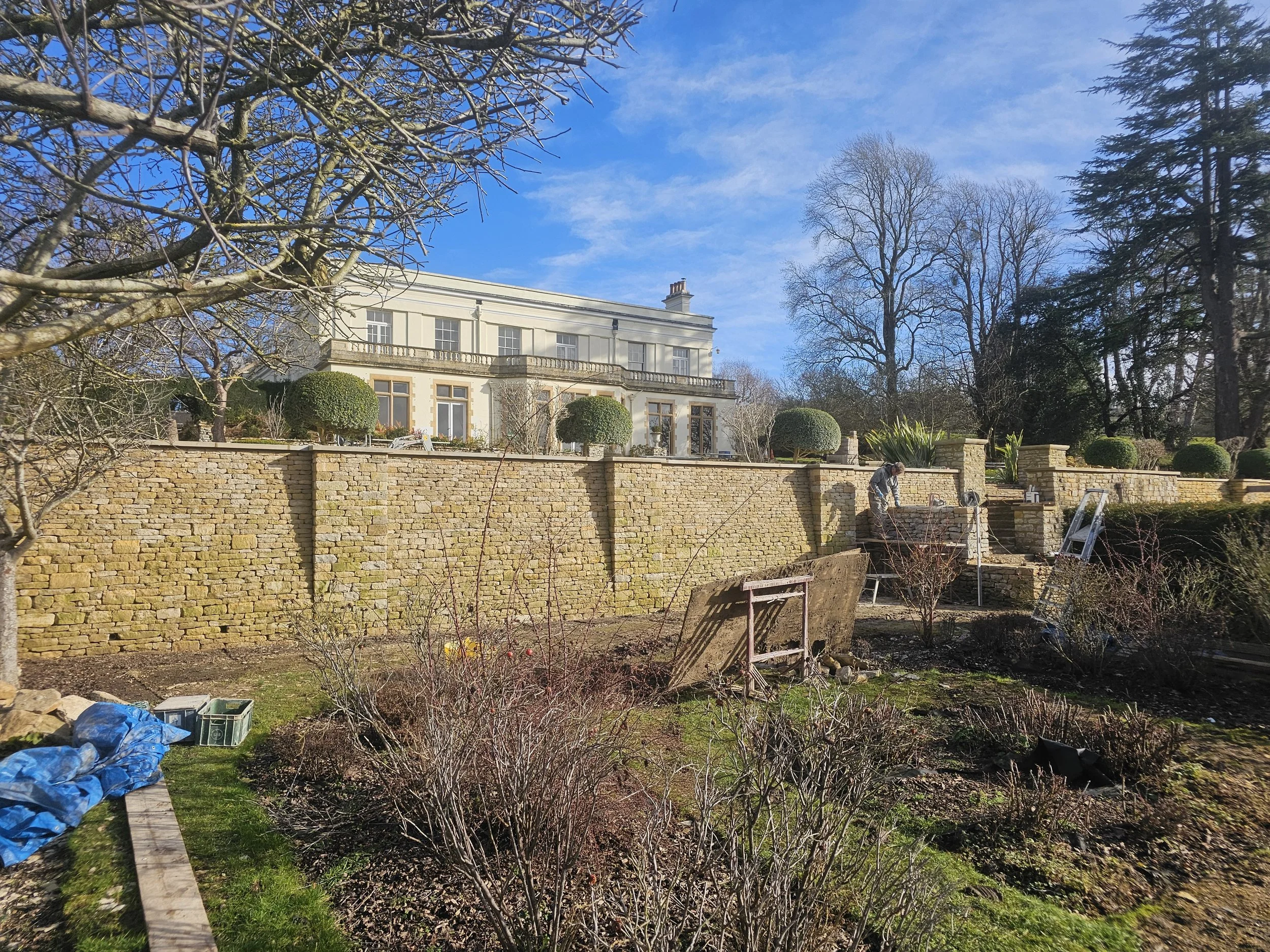 Bespoke Cotswold stone retaining walls.