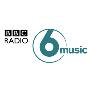 The image depicts the logo of BBC Radio 6 Music, featuring the text '6 music' with a stylized number 6 in a circle.
