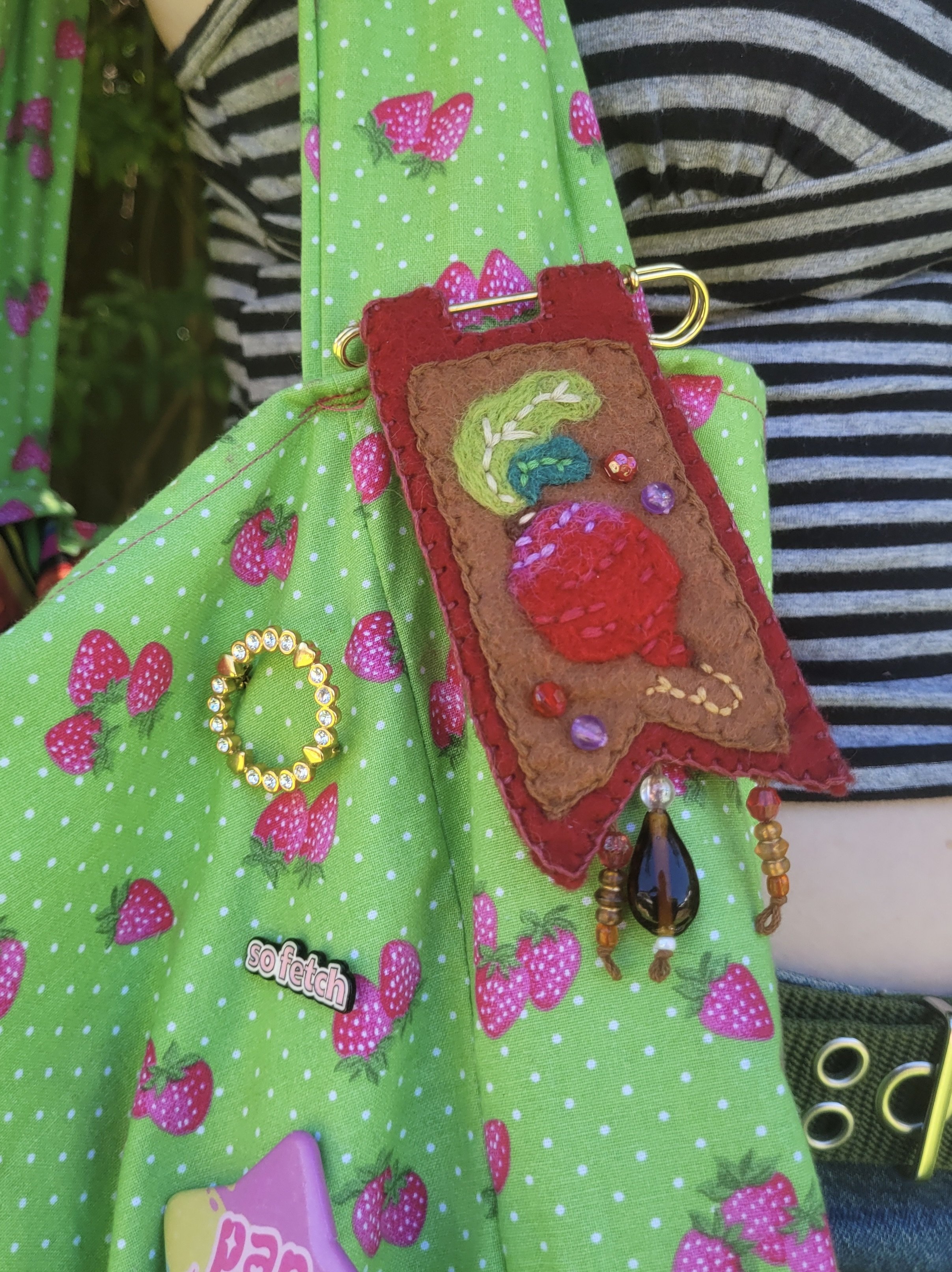 Beetroot pin on a bag.jpg