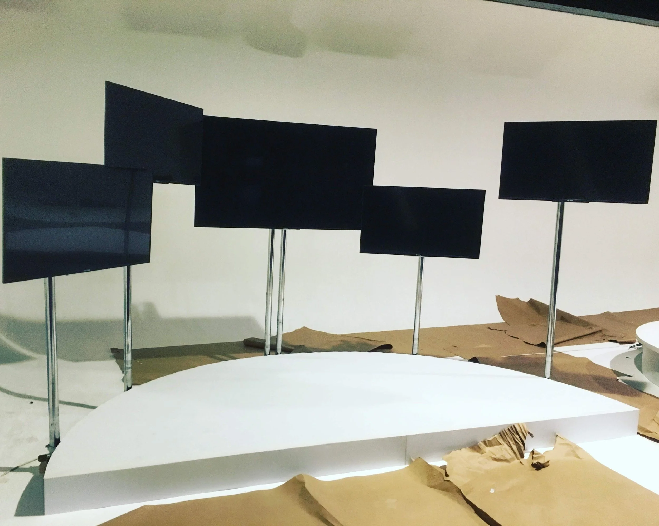 Display screens in a professional AV equipment setup