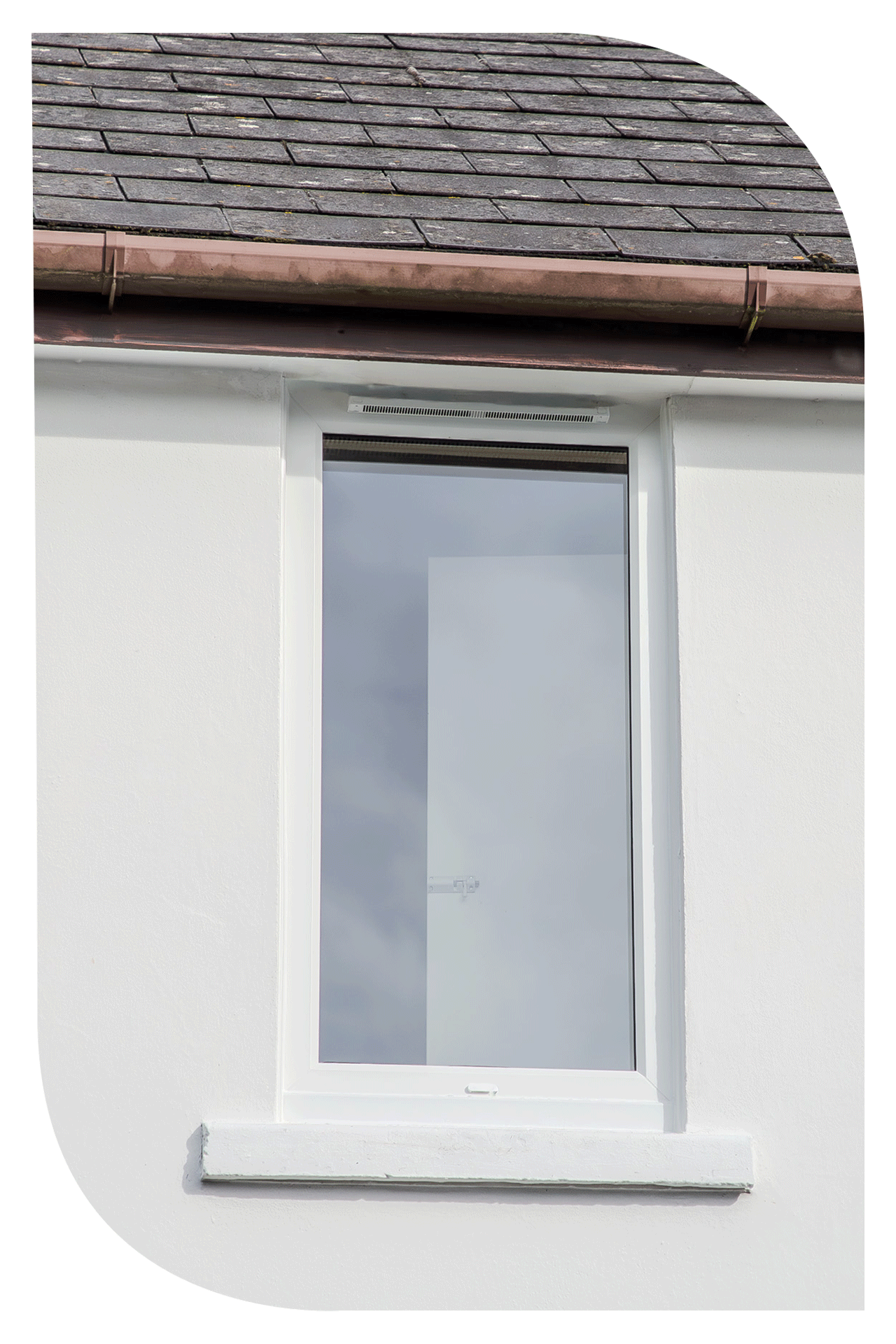 Close-up of a modern white window with a reflection of the sky, set into a white wall with a small ledge below.