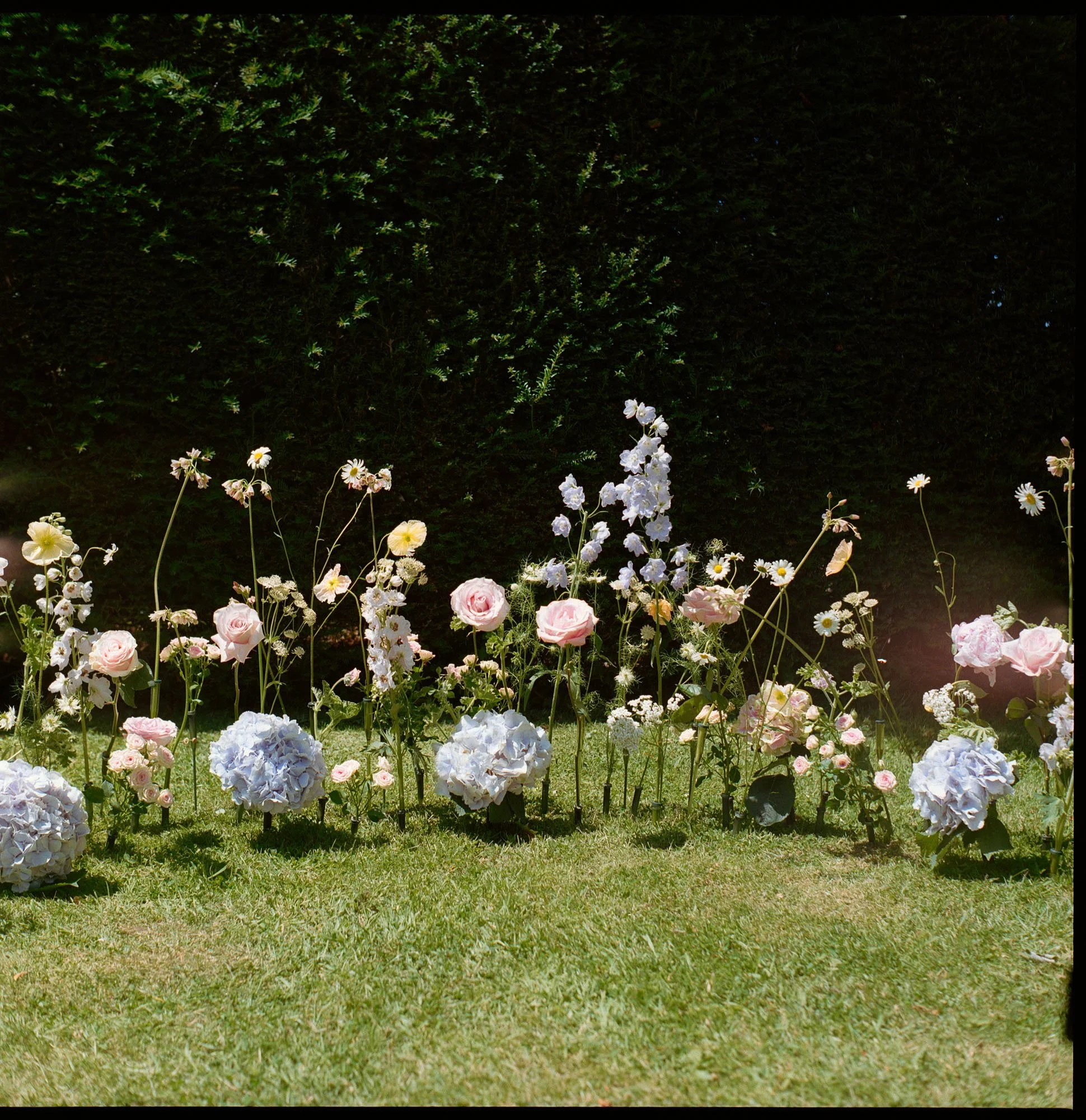 Charlotte_Dormoy_Film_Wedding_Photographer_Owlpen_Manor_Cotswold_Garden_Wedding_03.jpg