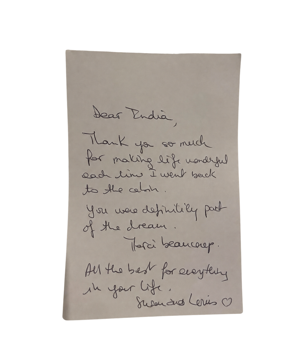 Handwritten thank you note addressed to India, expressing gratitude for making life wonderful, describing her as part of the dream, and wishing her all the best in her life, signed with a heart symbol.