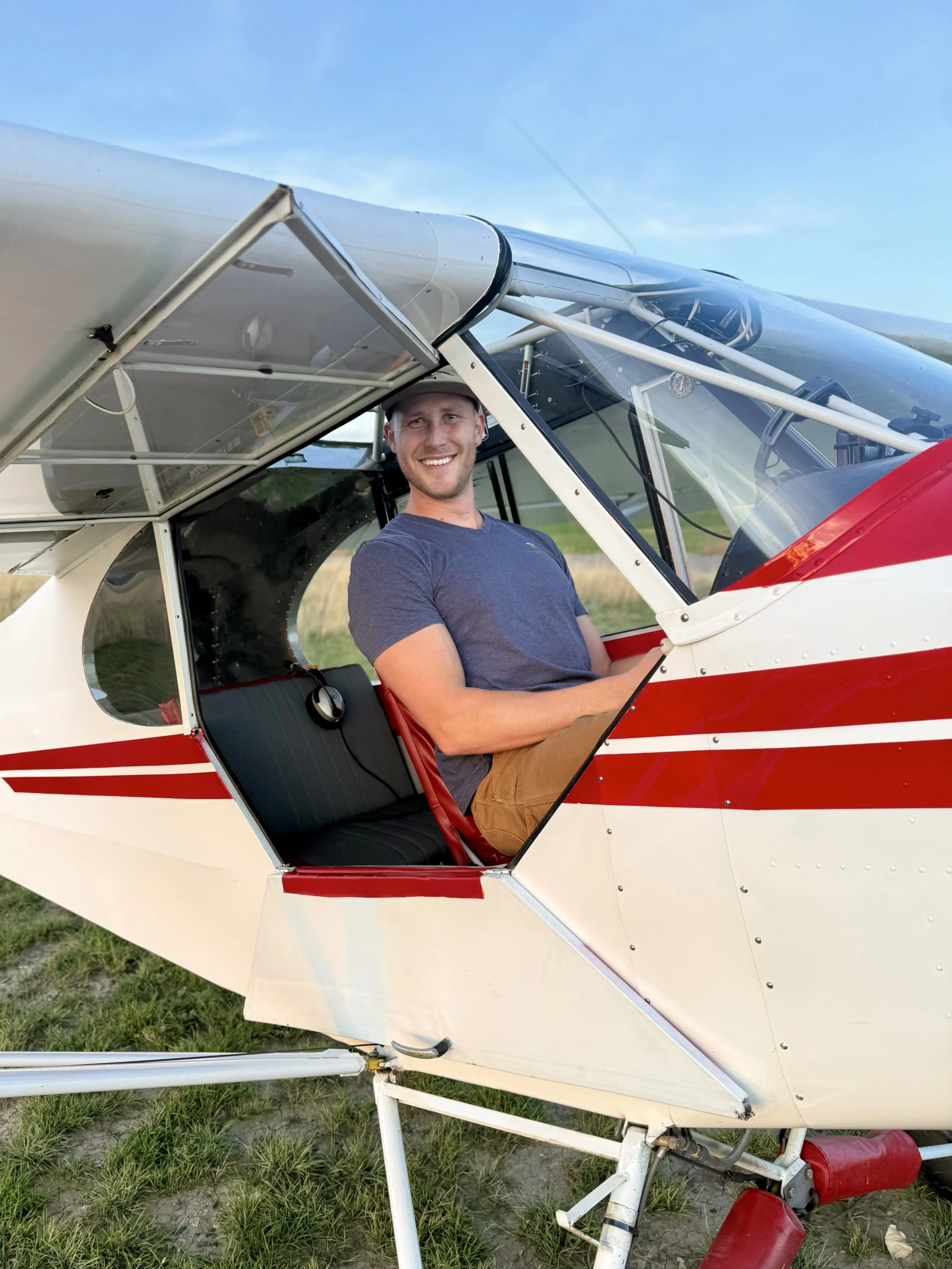 Dr. Matthew Hartman in his aircraft cockpit