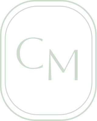 The initials CM within two tall rectangles with rounded corners
