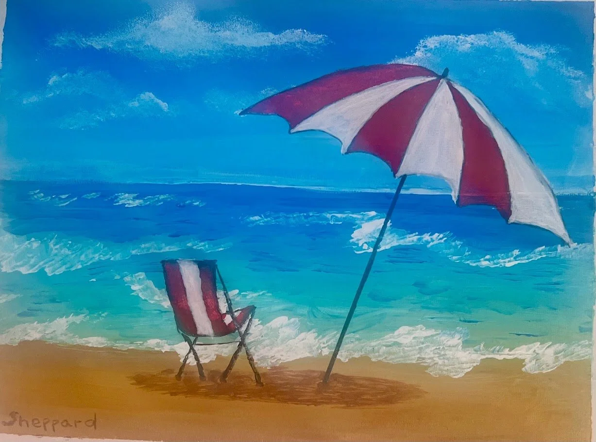 beach with red and white lounge chair.jpg