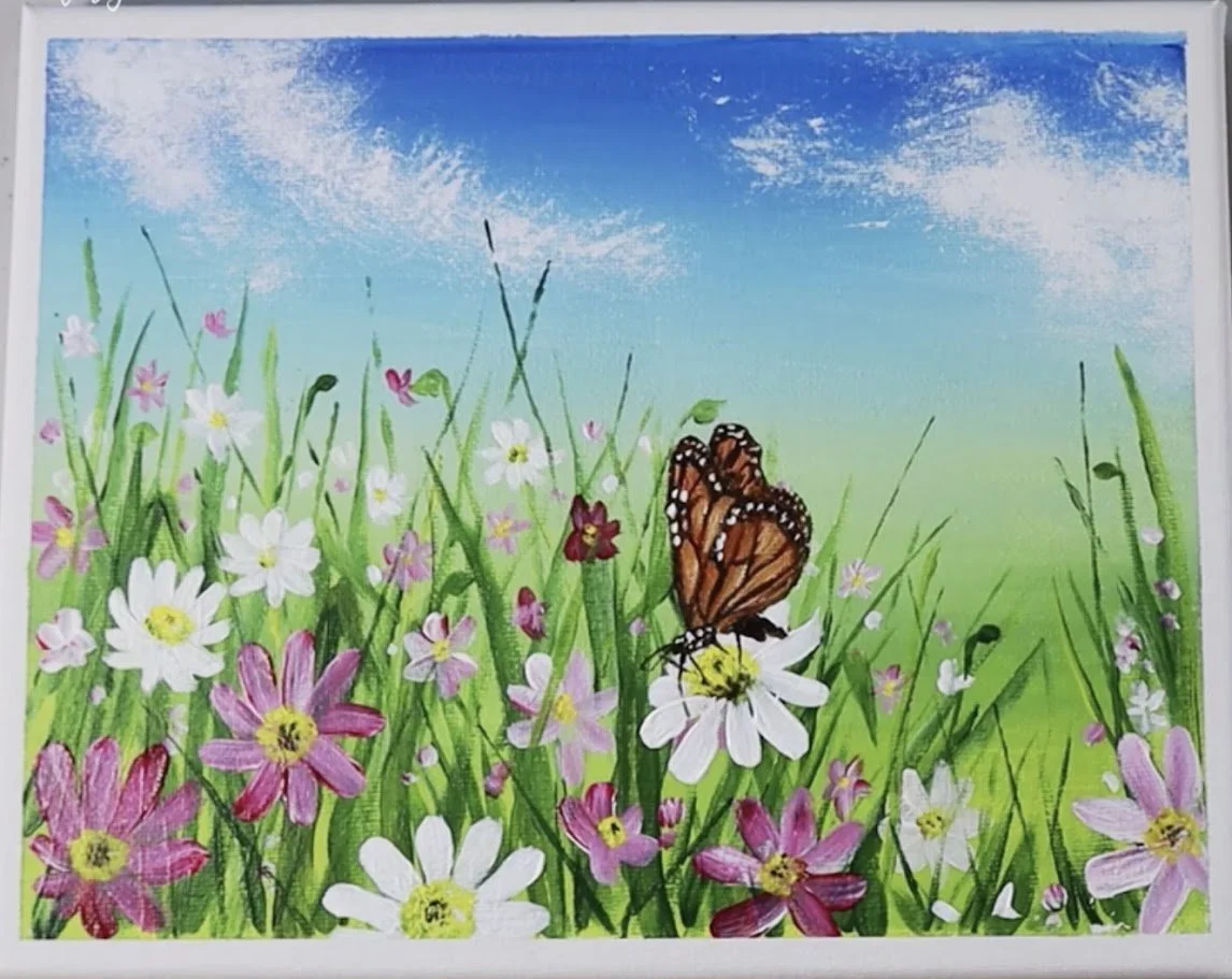 flowers in the field with butterfly.jpg