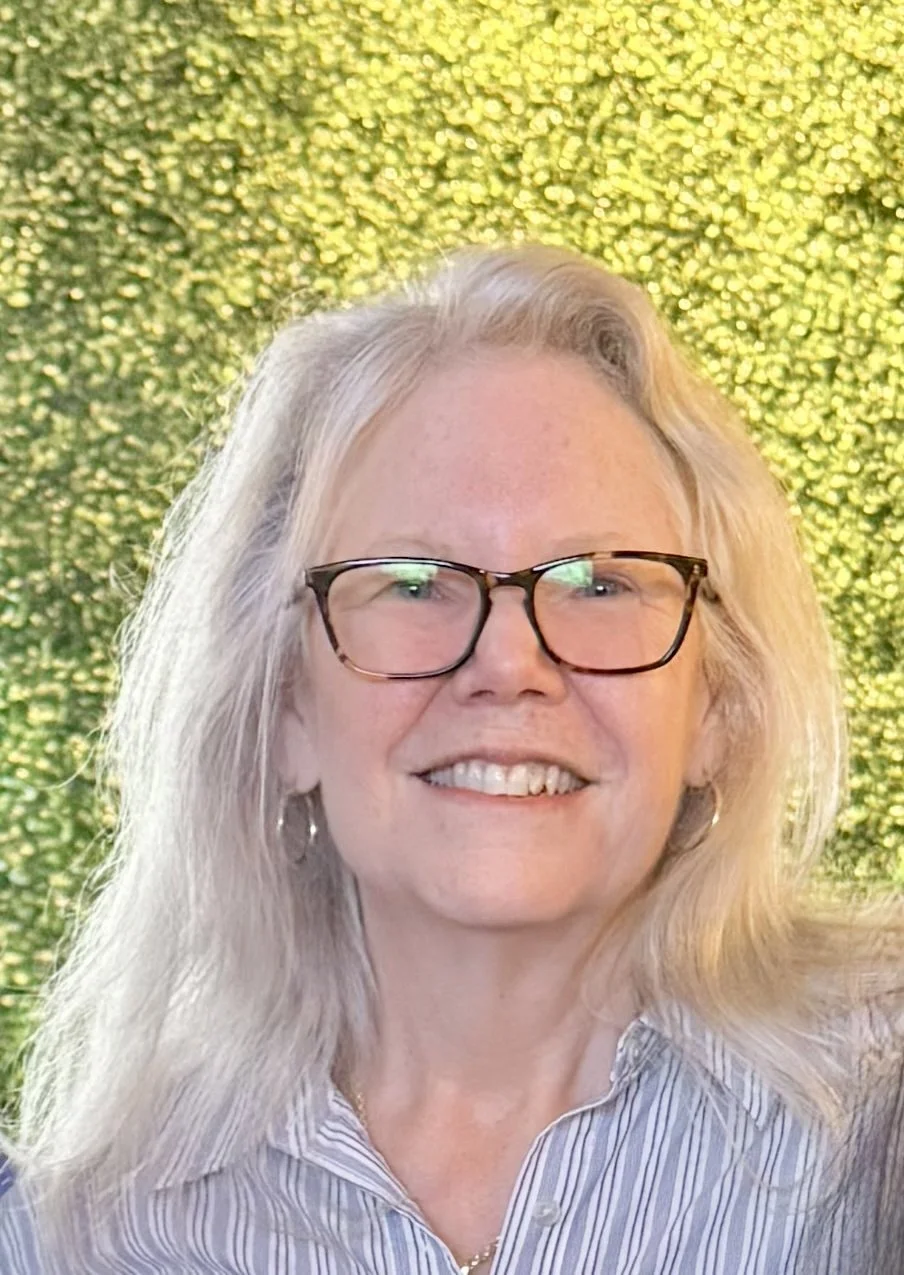 This is an image of one of the leather workers from Saint Petersburg, Florida. She is a co-founder, artist and creator from Tampa Bay. She both makes and creates the actual art and products made by Wishbone.