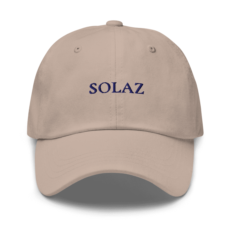SOLAZ Leisure Cap in Stone with navy lettering, front view; supplier digital embroidery mockup.