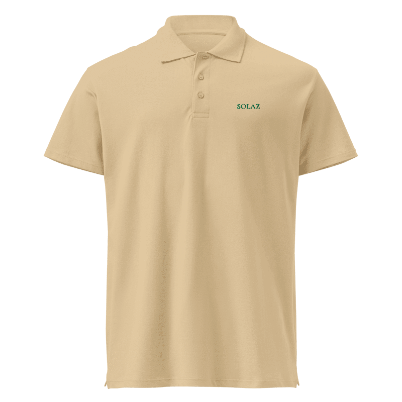 SOLAZ Coast Polo in Sand with green lettering, front view; supplier digital embroidery mockup.