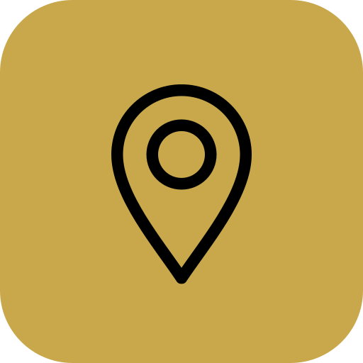 An icon of a location pin on a gold background.