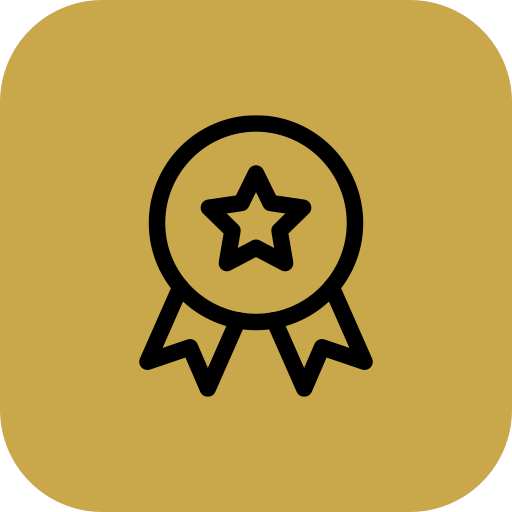 An award ribbon with a star in the center and two hanging ribbons