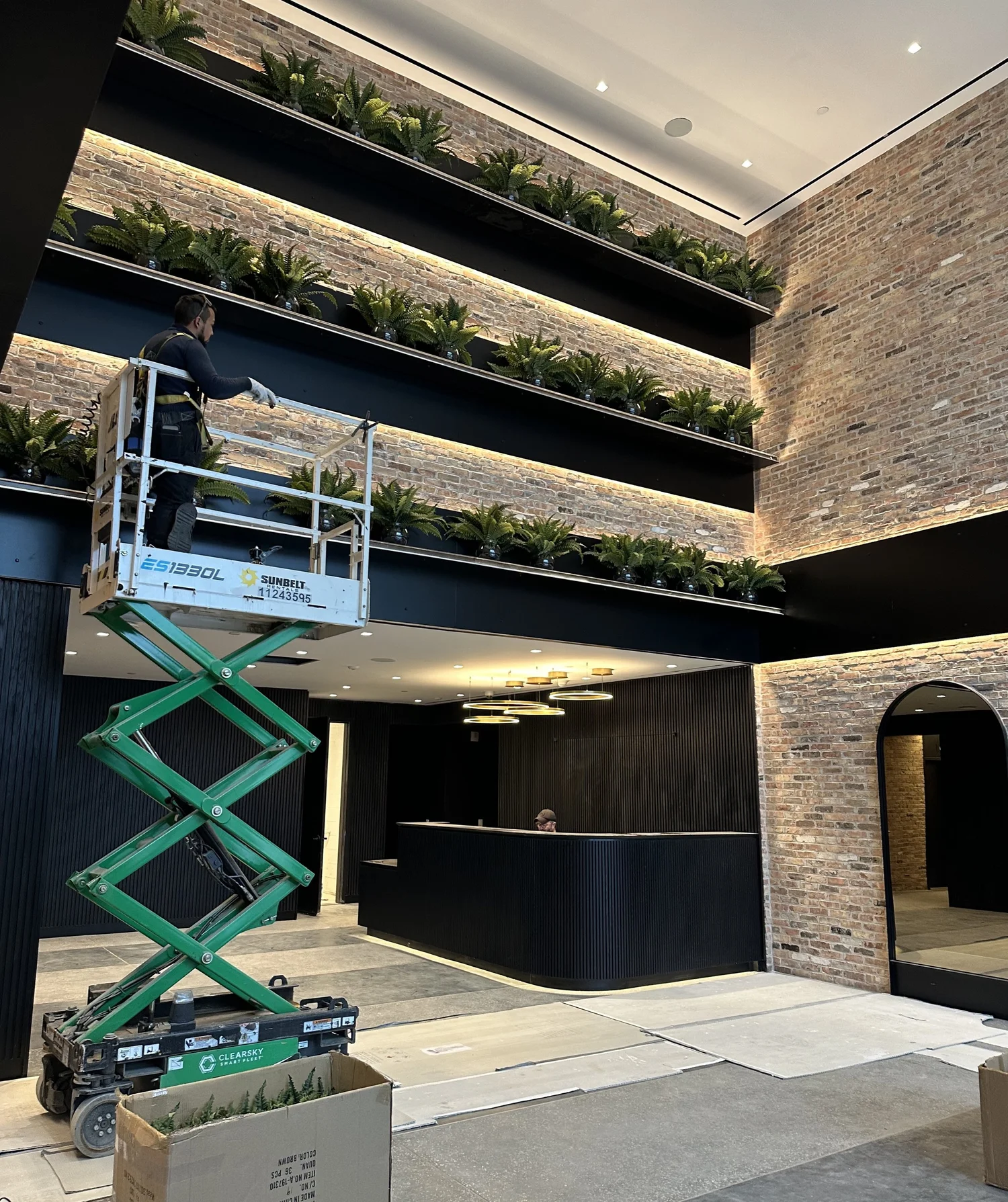 Installation of cascading planters on upper levels