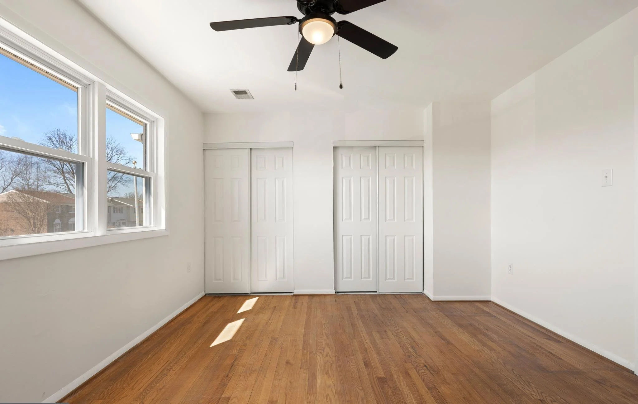 Refinished hardwood floors, bringing back the warmth and character of the original wood.