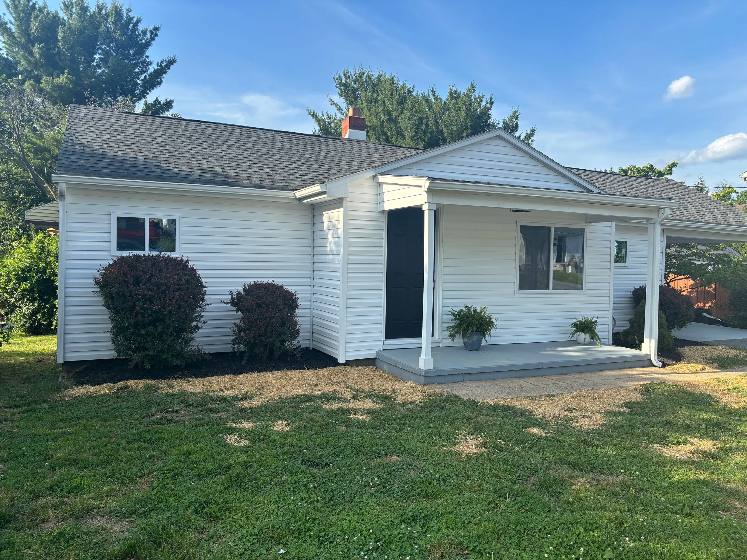 New siding and gutters installation, giving the exterior a clean, updated look and better protection from the weather.