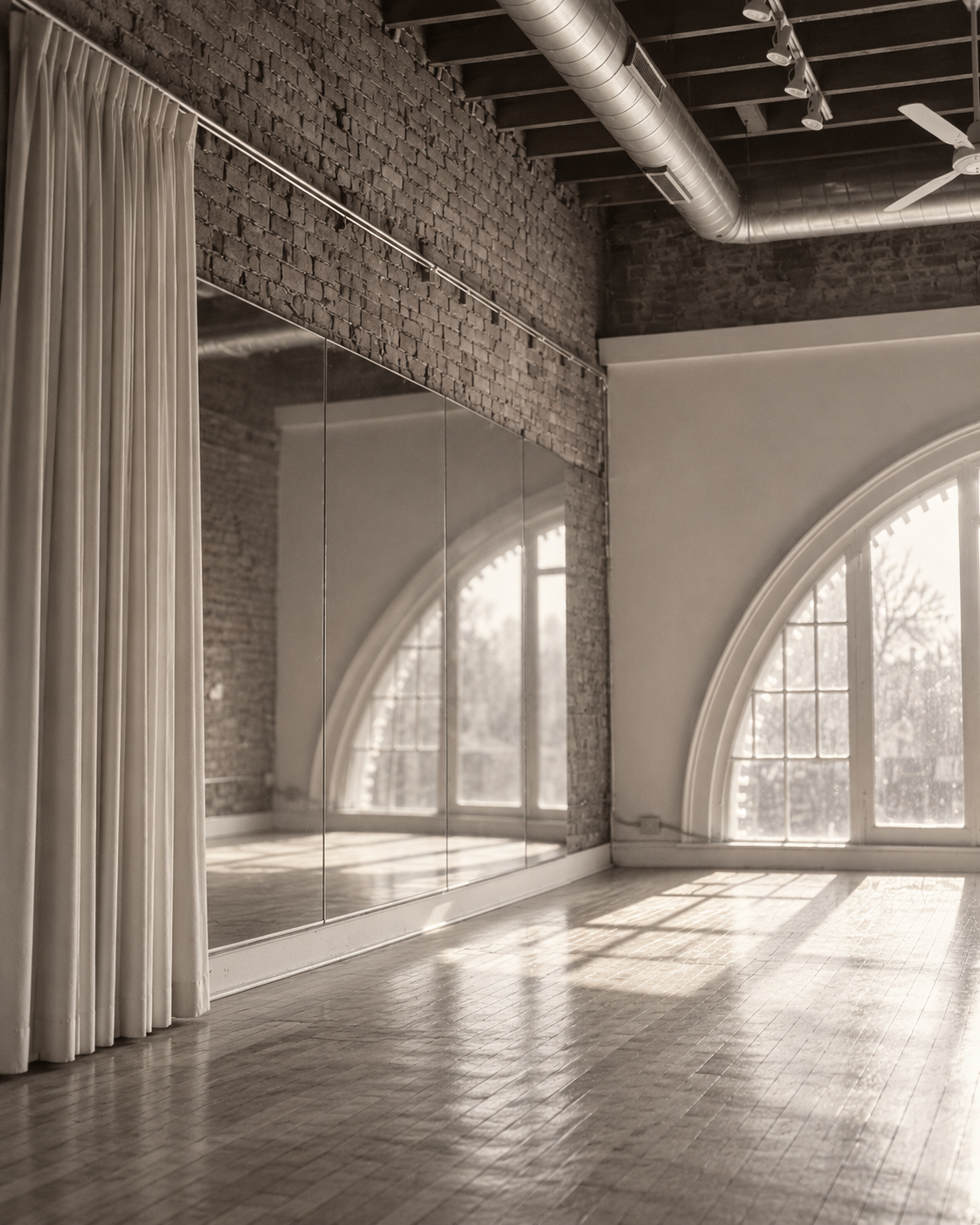 Brick, mirrors, and pleated morning light.png