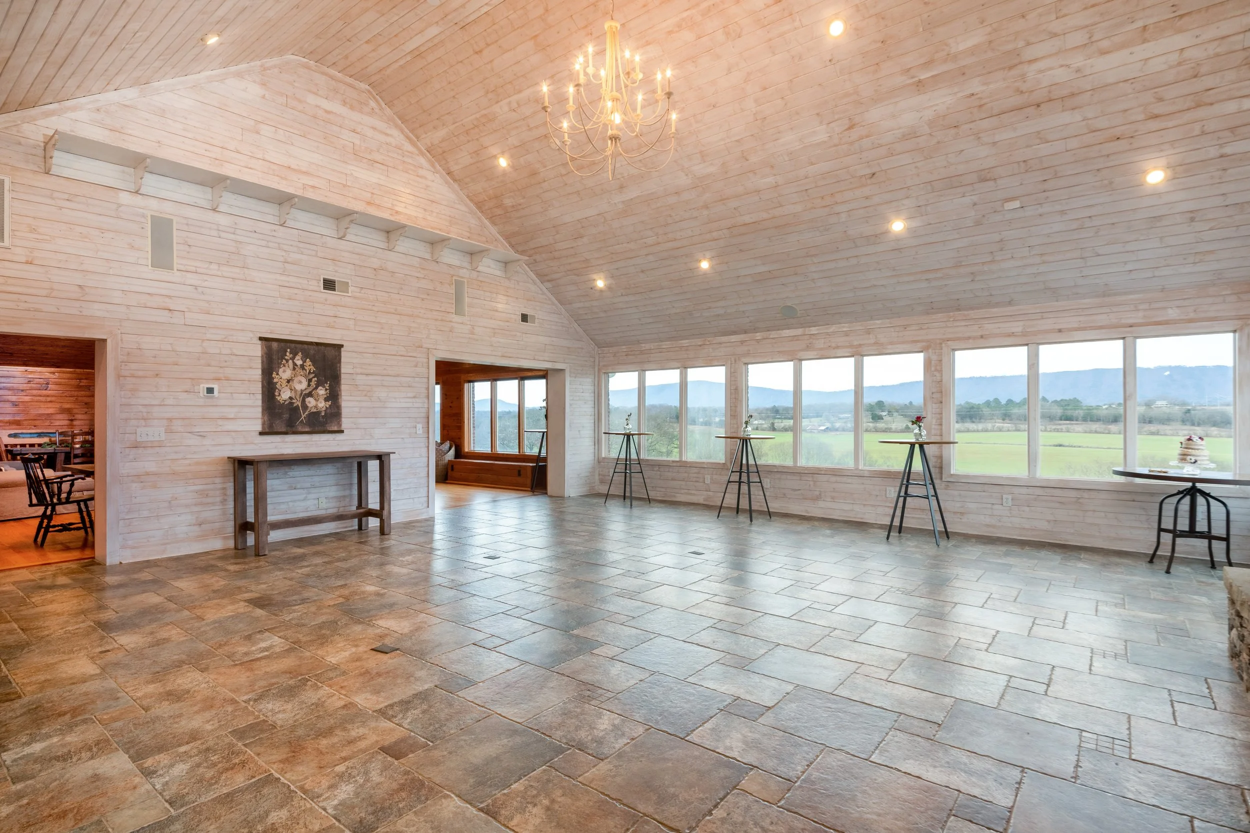 The sunroom at the Ocoee River Estate overlooks the Ocoee River and also features stunning mountain views