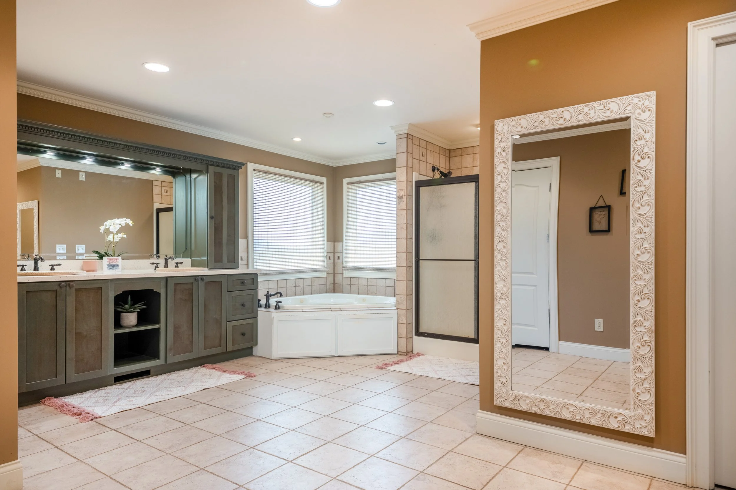 Expansive primary bathroom and closet at the Ocoee River Estate