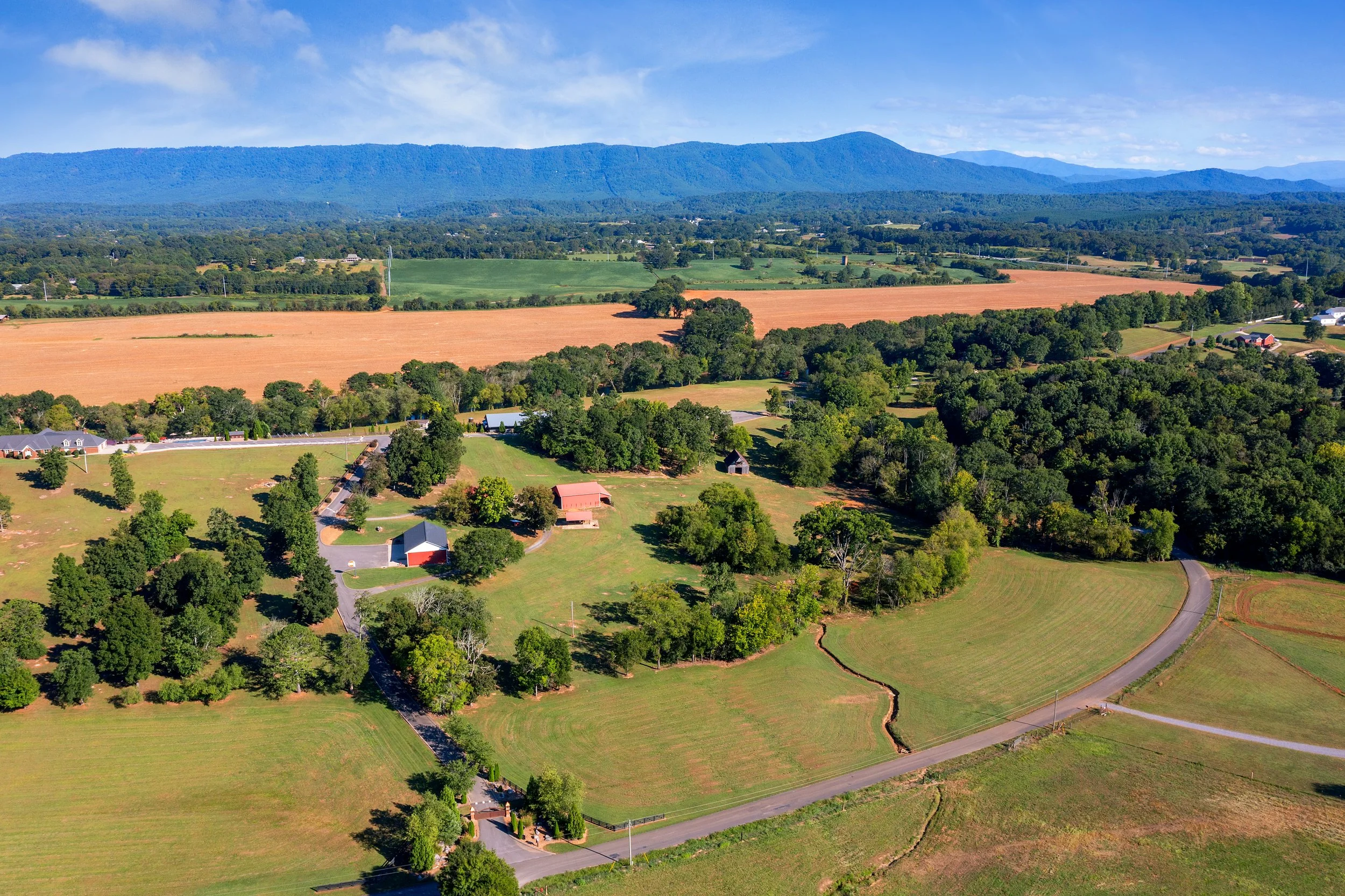 Bird's-eye view of Ocoee River Estate highlighting the expansive property, Ocoee River frontage, and surrounding Tennessee landscape.
