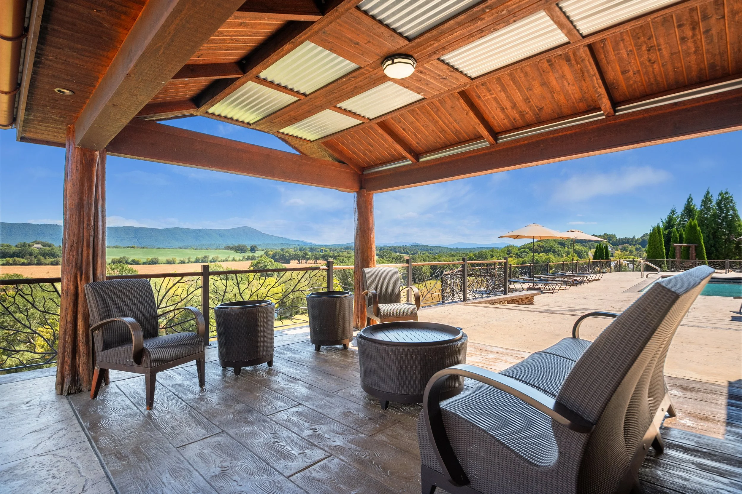 Covered seating area with river and mountain views at the Ocoee River Estate
