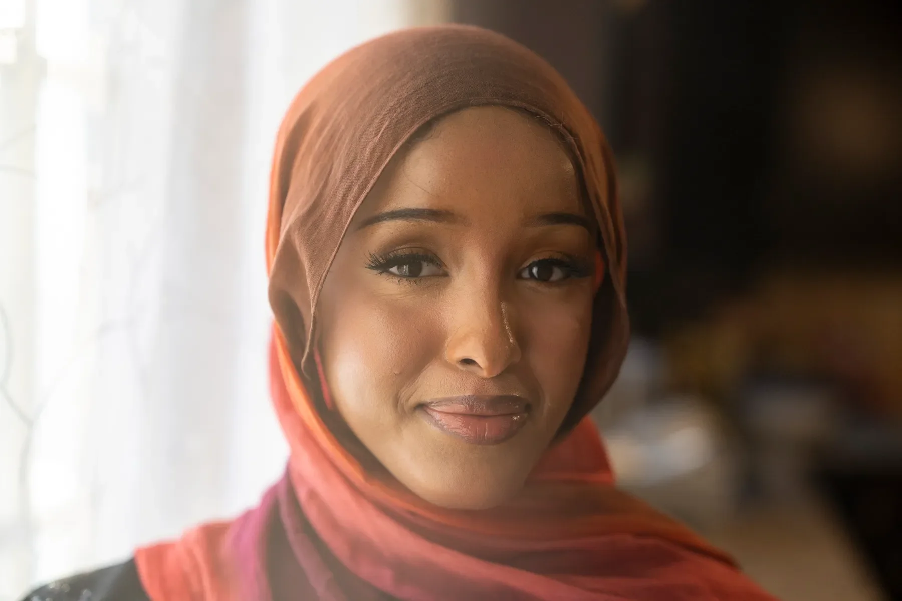 Inspired by her autistic siblings, Minneapolis Occupational Therapist launches sensory-friendly hijab.